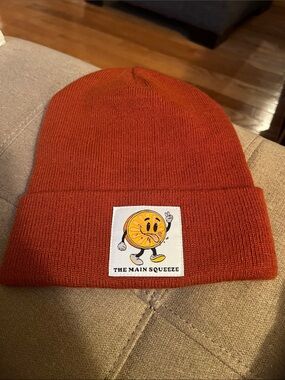 Orange Knit Beanie with 'The Main Squeeze' Patch